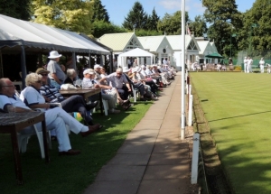 SPECTATORS WAITING FOR THE ACTION TO BEGIN